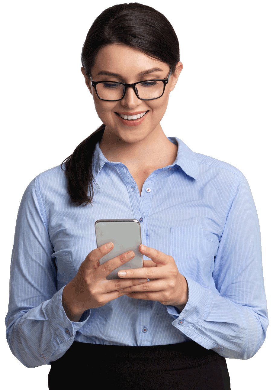 A woman looking at a phone while smiling